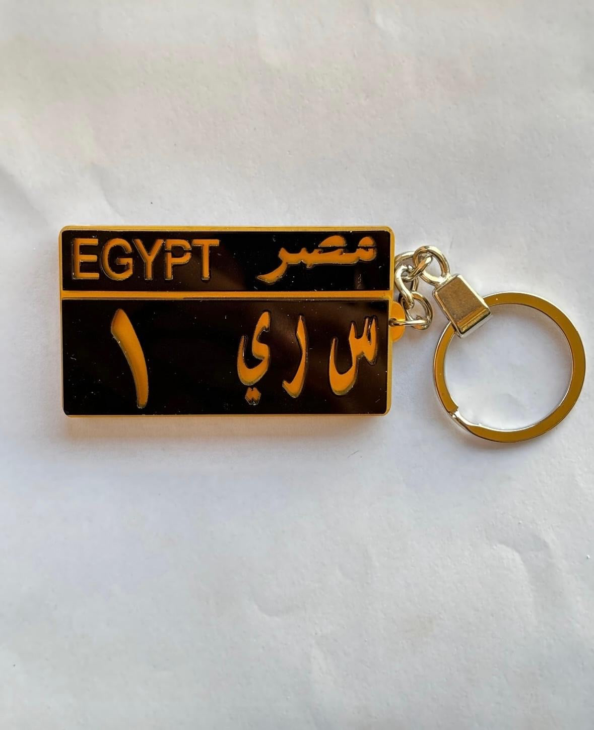 Custom Black Car

Plate Pendant_ميدالية مفتاح علي شكل لوحة السيارة باللون الاسود و الذهبي
